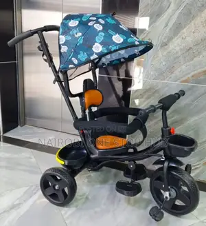 Kids' Push Tricycle With a Canopy.