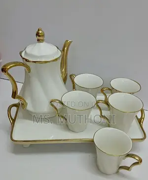 8 Piece White Ceramic Tea Set With Golden Rim