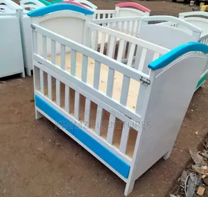 Cotbed With a Permanent Storage
