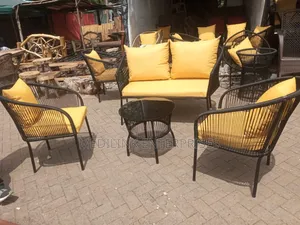 Metallic Handwoven Cushioned Outdoor 4-Seater Set and a Table
