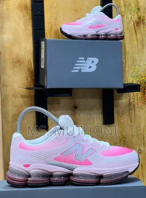 New Balance Abzorb Sneaker in the "Rose Sugar /Baby Blue /Black Gray
