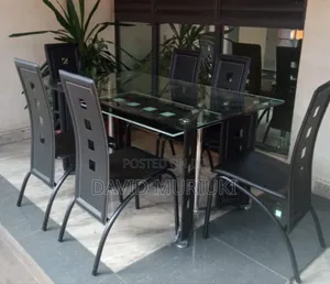 Executive 6 Sitter Glass Dinning Table With Leather Seat