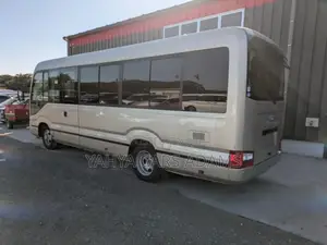 Toyota Coaster 2019 Beige