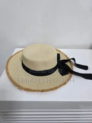 Elegahnt Widle Brim Straw Beach/Sun Hat With Black Ribbon