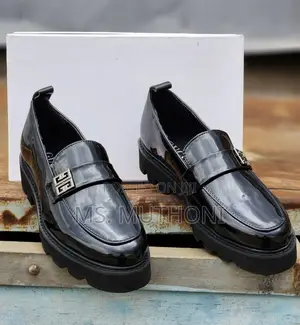Black Patent Leather Chunky Loafers With a Metal Chain Accent
