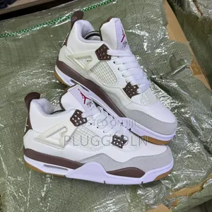 Nike Air Jordan 4 Retro Sneakers.