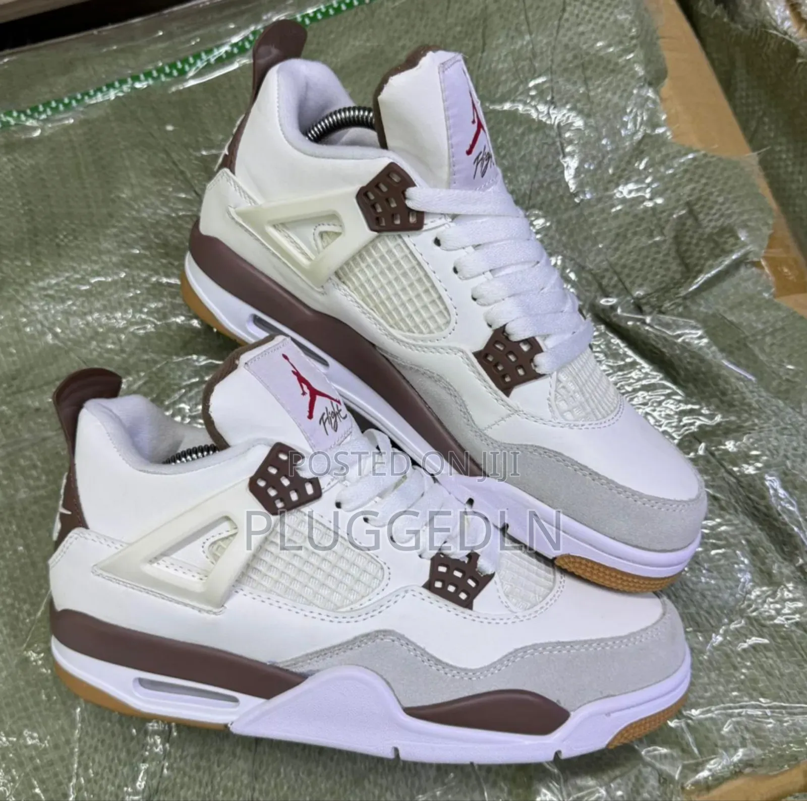 Nike Air Jordan 4 Retro Sneakers.