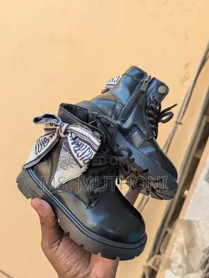 Beige /Black Girls' Boots With a Decorative Scarf Accent.