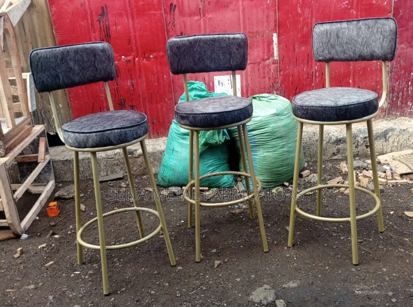 Custom-Made Kitchen Stools With Gray Seats and Gold Frames.