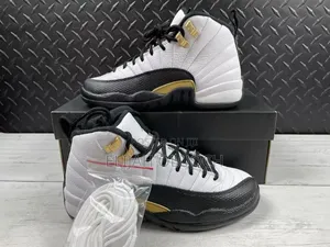 Air Jordan 12 Retro "Royalty Taxi" Sneakers.