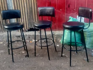Minimalist Black Stools With Premium Fabric Seating.