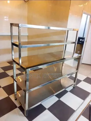 Stainless Steel Table With Overhead Shelves