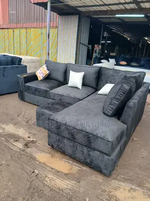 A Soft Black L-Shape Sofa