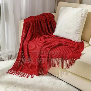 Textured Soft Knitted Throw Blanket With Tassels.