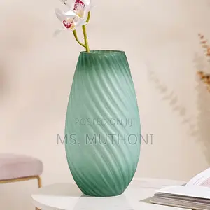 Sand Ripple Matte Ombre Glass Vase in Green With a Spiral Texture.