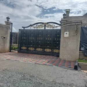 Modern Steel Swing Gates – Custom Designs Available