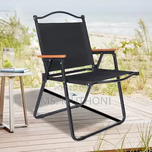 Folding Camping Chair With a Sturdy Frame and Wooden Armrests.