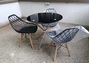 Dark Coffee Table and Black Eames Mesh Chair