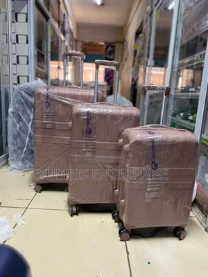 Rosegold Rubber 3 in 1 Suitcase Size 29 Full Set of 3