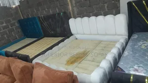 White 5 by 6 Upholstered Bed