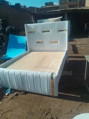 White 5 by 6 Chesterfield Panel Bed