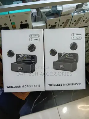 Wireless Lavalier Microphones With Charging Cases.