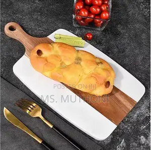 Acacia Wood and Marble Cutting and Serving Board.