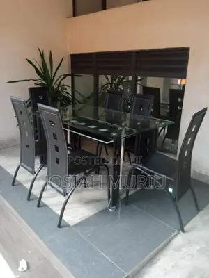 Executive 6 Sitter Glass Dinning Table With Leather Seat