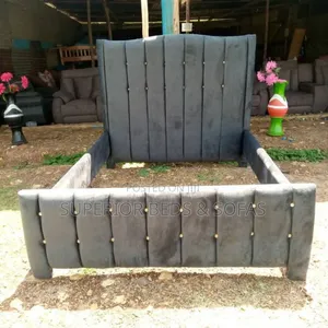 Tufted 4 × 6 Chesterfield Bed.