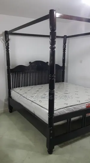 Wooden Four-Poster Bed