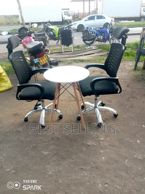 Office Chair and Round Eams Table