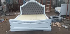 Tufted 5 by 6 Wooden Bed