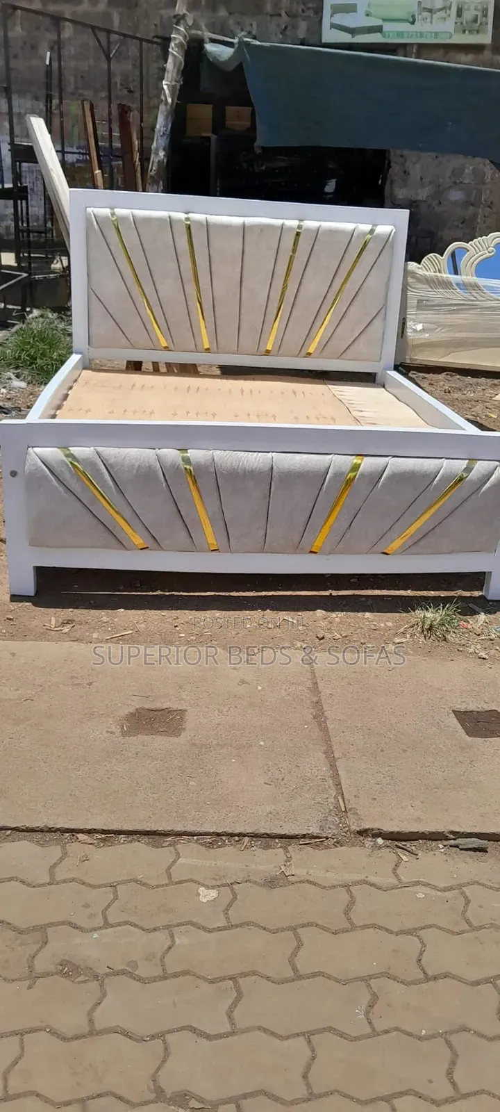 Upholstered Bed With Gold Strips