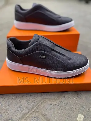 Lacoste Men's Matteo Slip-on Sneakers With a Faux Leather Upper.