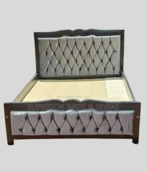 Padded Tufted 5 by 6 Bed.