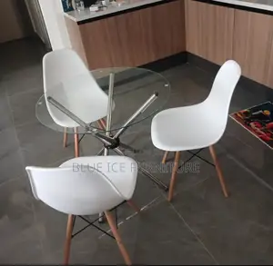 Transparent Coffee Table and Eames