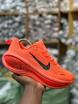 Nike Vomero Plus Running Shoe in the "Orange Pulse"