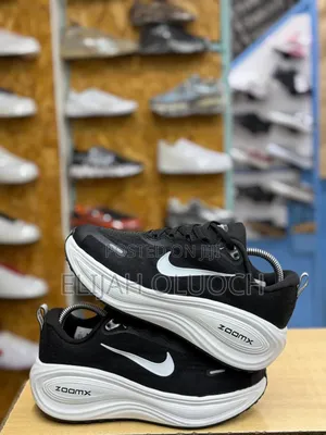 Black Nike Vomero Plus Road Running Shoes With White Zoomx Midsoles