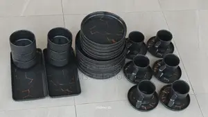 Stone Lain 32-Piece Porcelain Dinnerware Set in Black Gold Pattern.