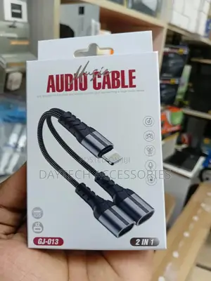 This Is a Braided Lightning to Dual Lightning Audio Charge Adapter.
