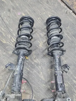 Shock Nissan March K13