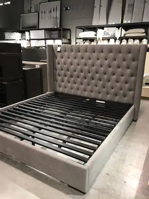 Elegant Gray Tufted Bed With Low Back