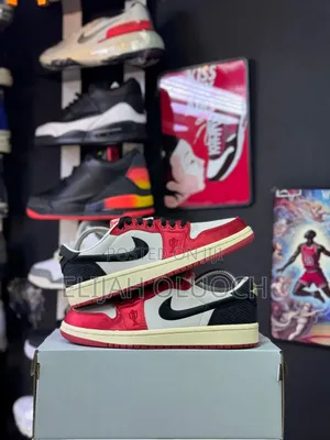 Trophy Room X Air Jordan 1 Low Og "Sail and Varsity Red" Sneaker.