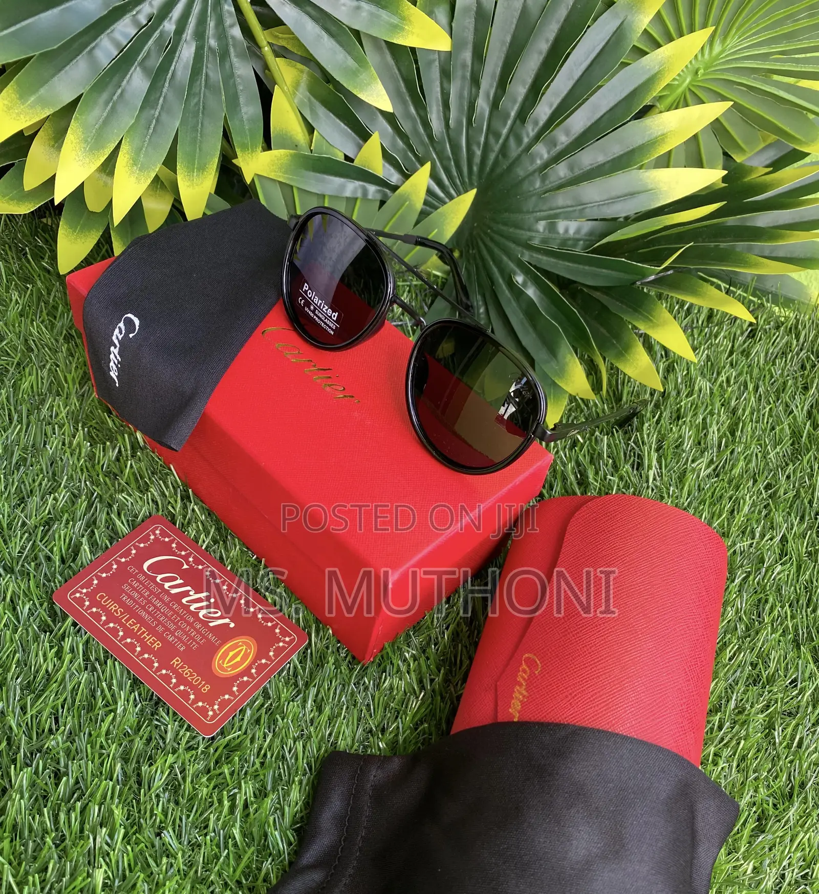 Boxed Cartier Black Round / C Rectangular Polarized Sunglasses.