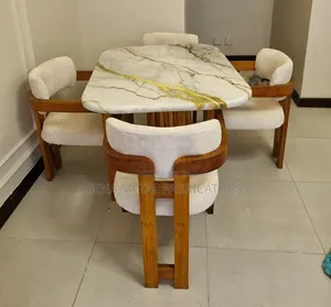 Elegant Upholstered Mahogany Dining Set.