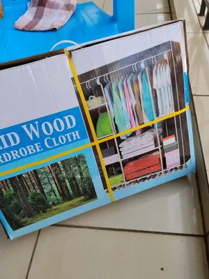 3-Column Wooden Wardrobe - 6 Doors, Fit for Family Storage!"