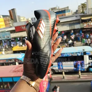 Durable Kids Football Boots For Turf And Pitch