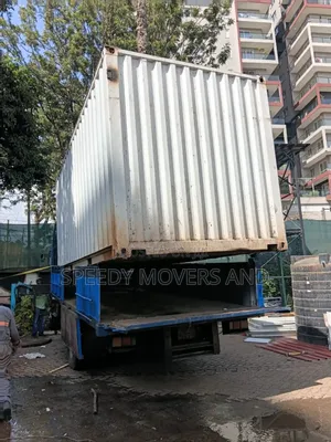 Trucks With Hoisting Cranes Are Available for Delivery and Logistics