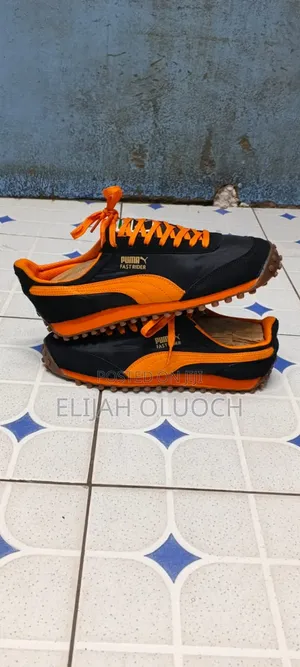 Puma Fast Rider Og Pack Sneakers in the Black and Vibrant Orange