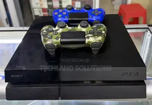 Like New Chipped Ps4 Standard With 2 Pads and 10 Games
